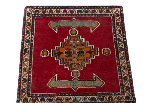Surface texture of 2000s Shiraz rug with natural Wool and intricate pattern