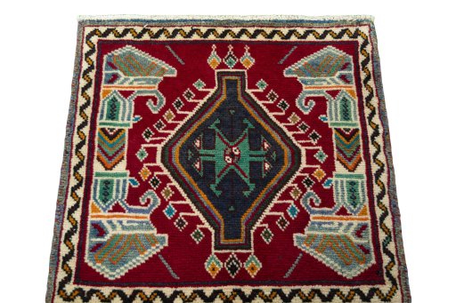 Surface texture of 2000s Shiraz rug with natural Wool and intricate pattern