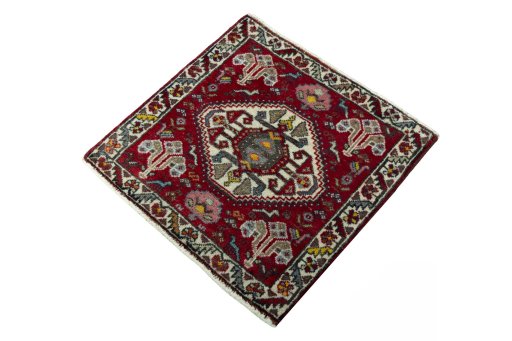 Corner detail of 2000s Shiraz rug showing border pattern and Wool pile