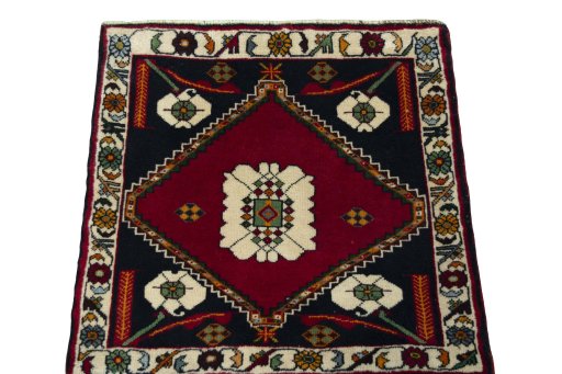 Surface texture of 2000s Shiraz rug with natural Wool and intricate pattern