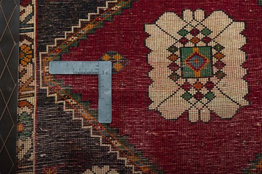 Backside of handmade 2000s Shiraz rug showing knot structure and weave density