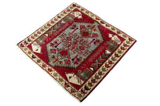Corner detail of 2000s Shiraz rug showing border pattern and Wool pile