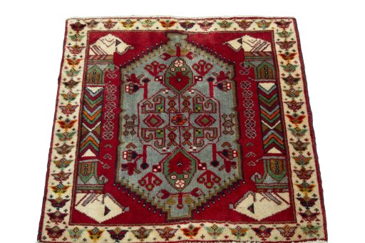 Surface texture of 2000s Shiraz rug with natural Wool and intricate pattern