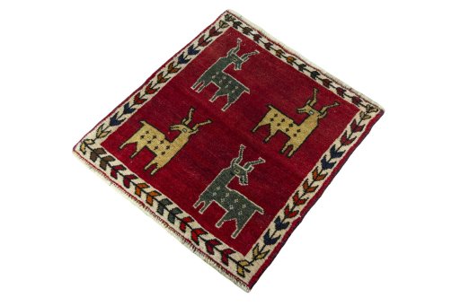 Corner detail of 2000s Shiraz rug showing border pattern and Wool pile