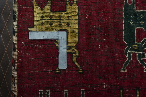 Backside of handmade 2000s Shiraz rug showing knot structure and weave density