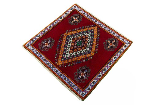 Corner detail of 2000s Shiraz rug showing border pattern and Wool pile
