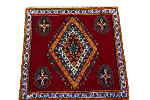 Surface texture of 2000s Shiraz rug with natural Wool and intricate pattern