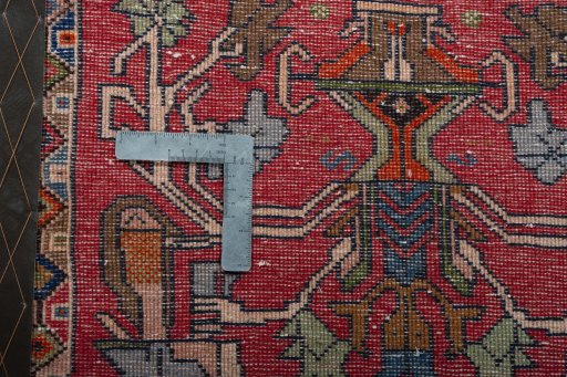 Backside of handmade 2000s Shiraz rug showing knot structure and weave density