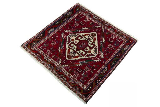 Corner detail of 2000s Shiraz rug showing border pattern and Wool pile