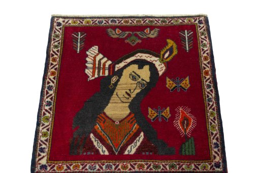 Surface texture of 2000s Shiraz rug with natural Wool and intricate pattern