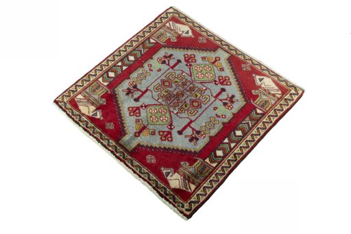 Corner detail of 2000s Shiraz rug showing border pattern and Wool pile