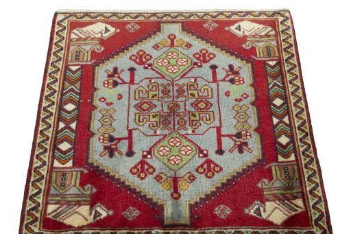 Surface texture of 2000s Shiraz rug with natural Wool and intricate pattern