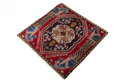 Corner detail of 2000s Shiraz rug showing border pattern and Wool pile