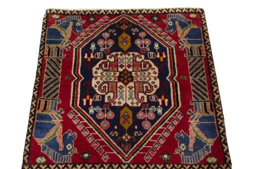 Surface texture of 2000s Shiraz rug with natural Wool and intricate pattern
