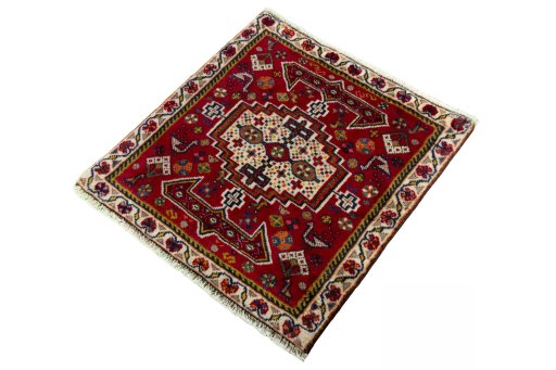 Corner detail of 2000s Shiraz rug showing border pattern and Wool pile