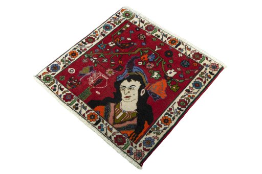 Corner detail of 2000s Shiraz rug showing border pattern and Wool pile