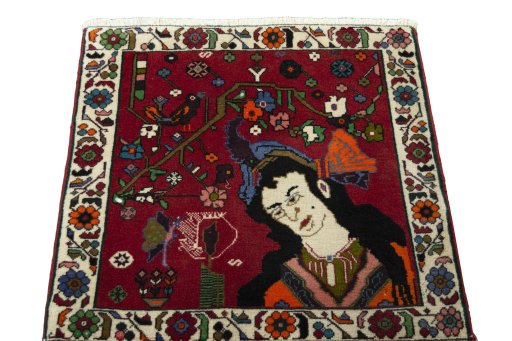 Surface texture of 2000s Shiraz rug with natural Wool and intricate pattern