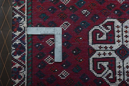 Backside of handmade 2000s Shiraz rug showing knot structure and weave density