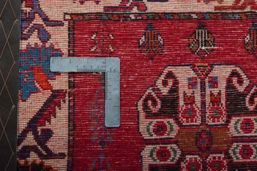 Backside of handmade 2000s Shiraz rug showing knot structure and weave density