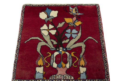 Surface texture of 2000s Shiraz rug with natural Wool and intricate pattern