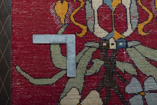 Backside of handmade 2000s Shiraz rug showing knot structure and weave density