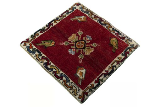 Corner detail of 2000s Shiraz rug showing border pattern and Wool pile