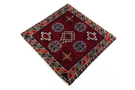 Corner detail of 2000s Shiraz rug showing border pattern and Wool pile