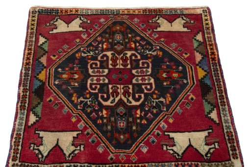 Surface texture of 2000s Shiraz rug with natural Wool and intricate pattern