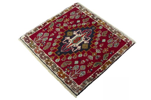 Corner detail of 2000s Shiraz rug showing border pattern and Wool pile