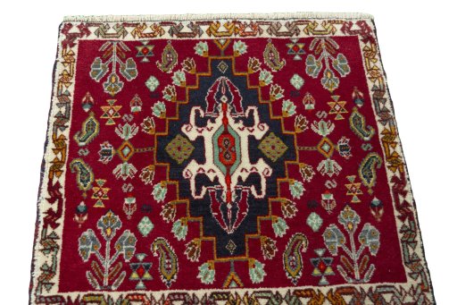Surface texture of 2000s Shiraz rug with natural Wool and intricate pattern