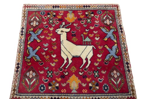 Surface texture of 2000s Shiraz rug with natural Wool and intricate pattern