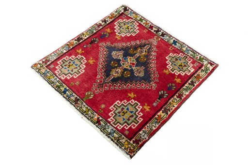 Corner detail of 2000s Shiraz rug showing border pattern and Wool pile