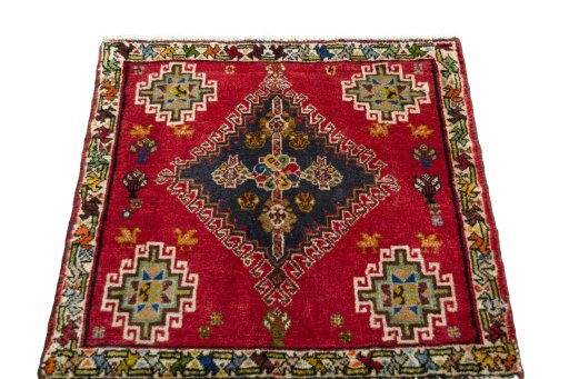 Surface texture of 2000s Shiraz rug with natural Wool and intricate pattern