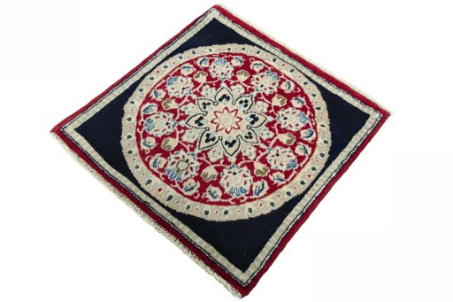 Corner detail of 2000s Shiraz rug showing border pattern and Wool pile