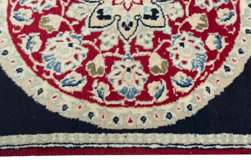 Central medallion detail of 2000s Shiraz rug from Iran / Persia