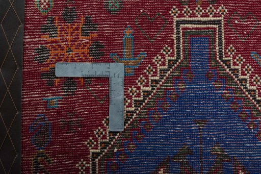 Backside of handmade 2000s Shiraz rug showing knot structure and weave density