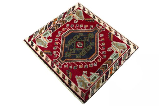 Corner detail of 2000s Shiraz rug showing border pattern and Wool pile