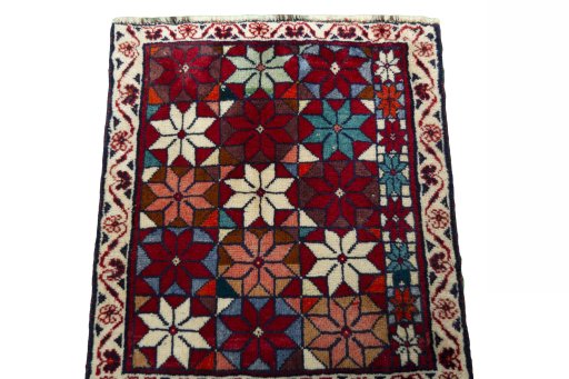 Surface texture of 2000s Shiraz rug with natural Wool and intricate pattern