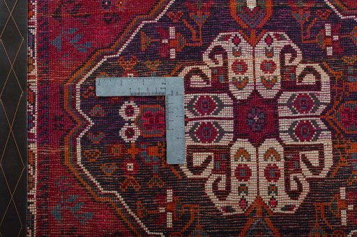 Backside of handmade 2000s Shiraz rug showing knot structure and weave density