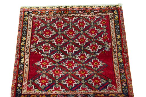 Surface texture of 2000s Shiraz rug with natural Wool and intricate pattern