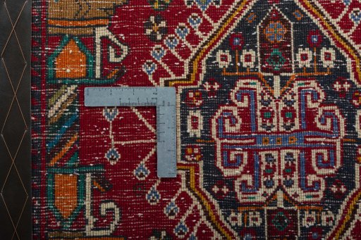 Backside of handmade 2000s Shiraz rug showing knot structure and weave density