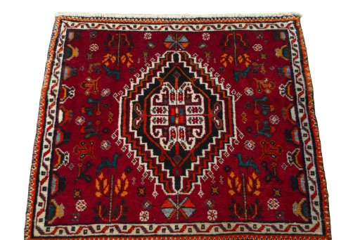 Surface texture of 2000s Shiraz rug with natural Wool and intricate pattern