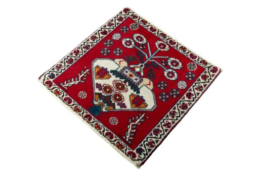 Corner detail of 2000s Shiraz rug showing border pattern and Wool pile