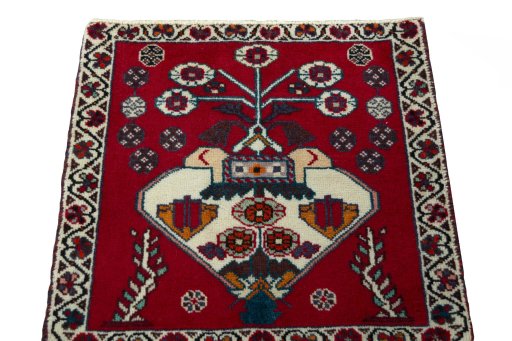 Surface texture of 2000s Shiraz rug with natural Wool and intricate pattern