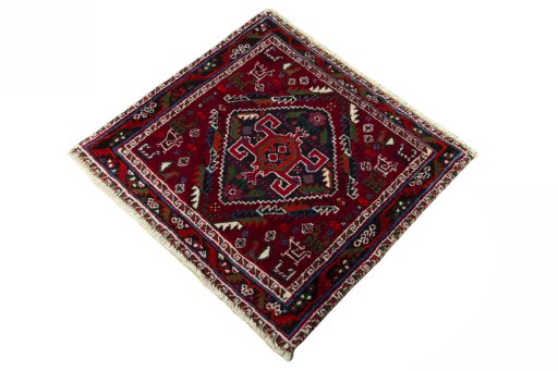 Corner detail of 2000s Shiraz rug showing border pattern and Wool pile