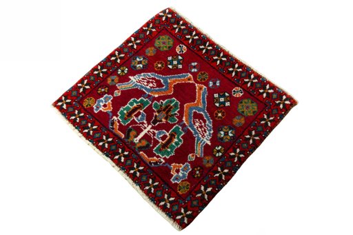 Corner detail of 2000s Shiraz rug showing border pattern and Wool pile