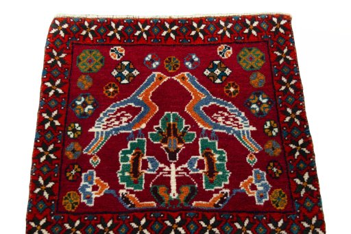Surface texture of 2000s Shiraz rug with natural Wool and intricate pattern