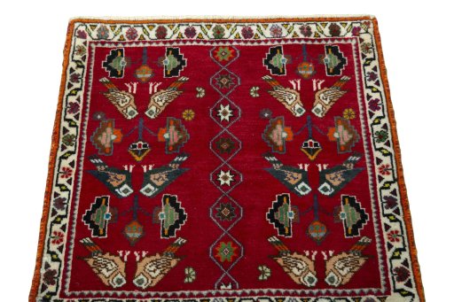 Surface texture of 2000s Shiraz rug with natural Wool and intricate pattern
