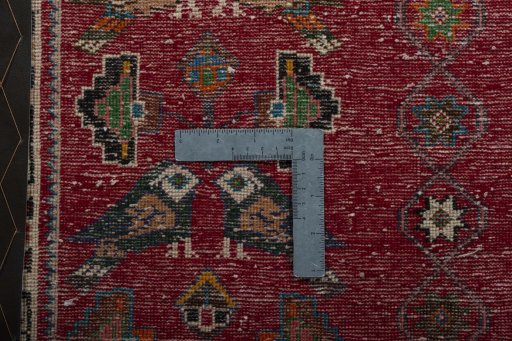 Backside of handmade 2000s Shiraz rug showing knot structure and weave density