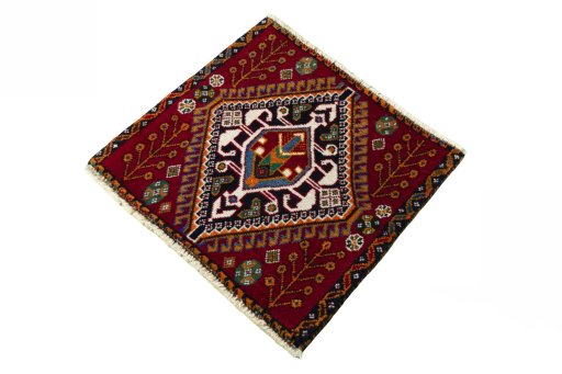 Corner detail of 2000s Shiraz rug showing border pattern and Wool pile